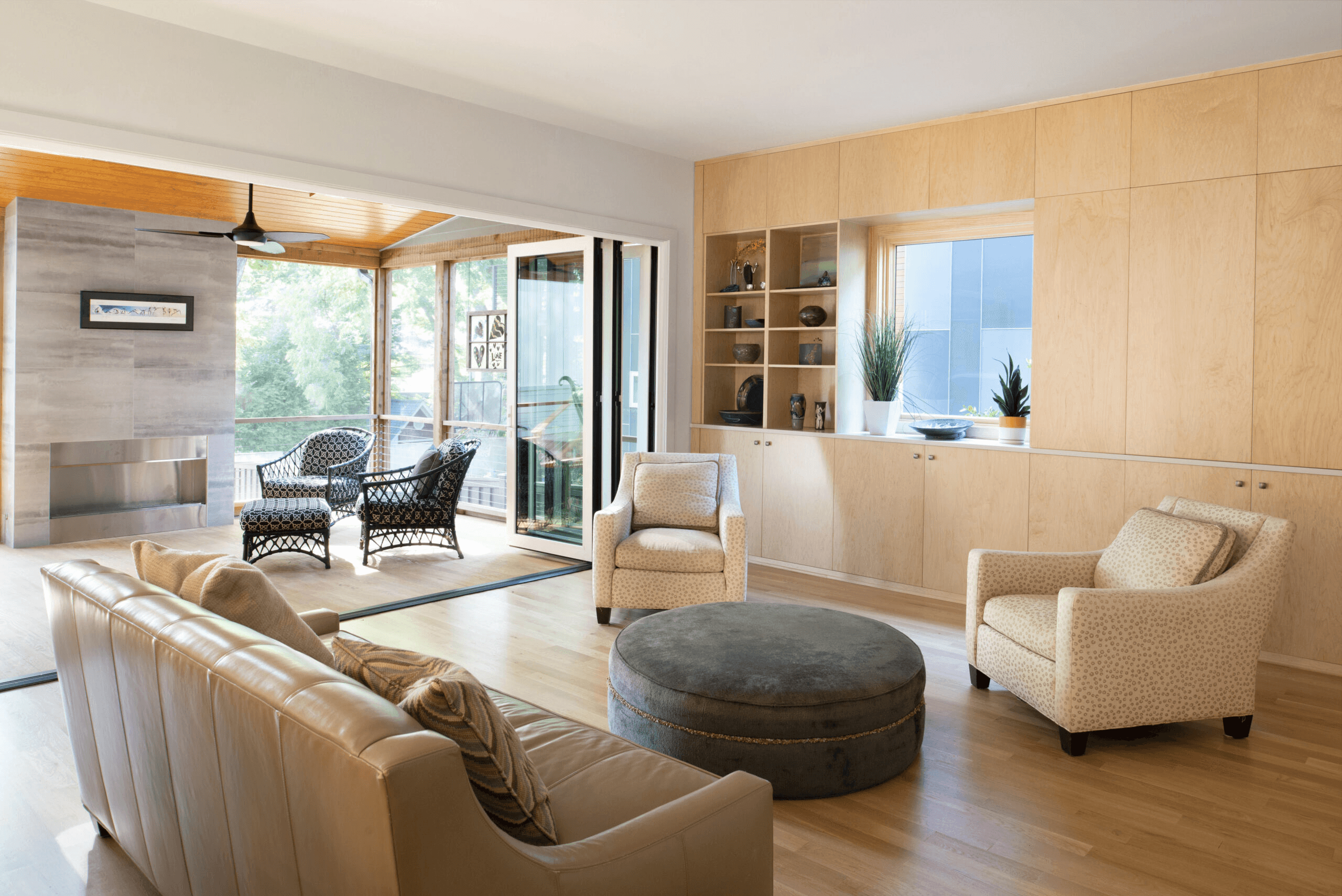 a living room with furniture and a fire place