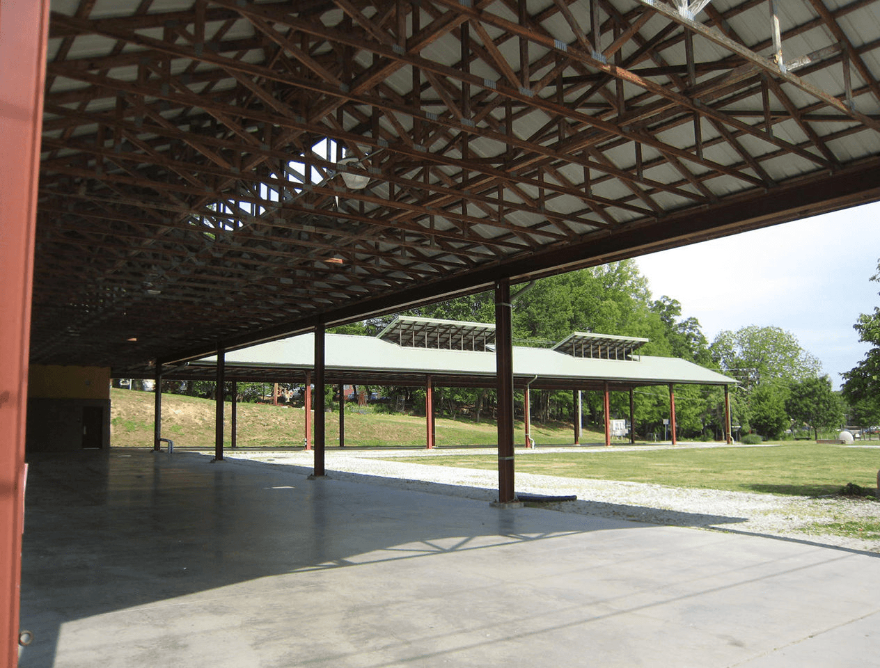 a large open area with a metal roof