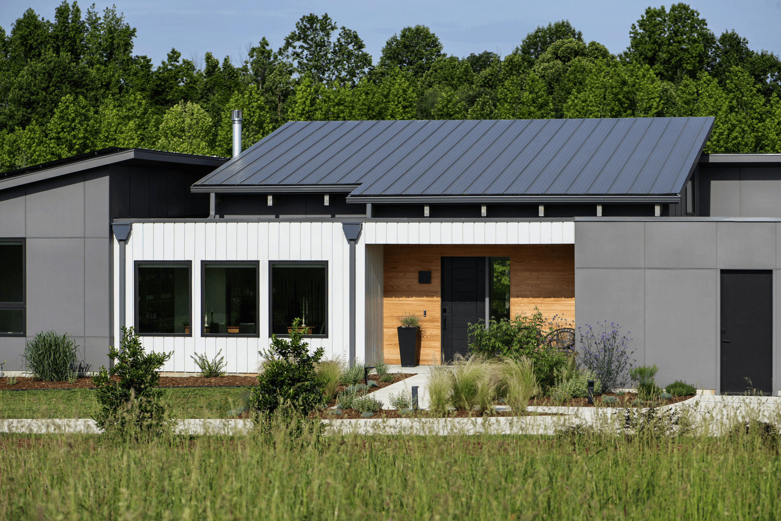 a house with trees at the back