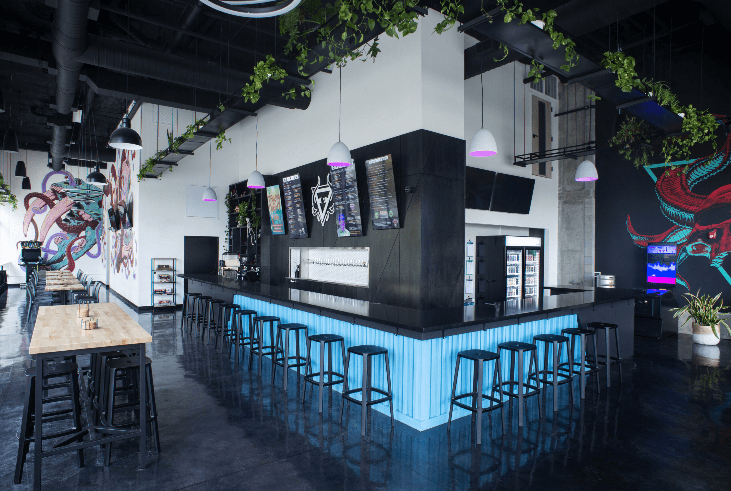 bar with a bunch of stools next to it